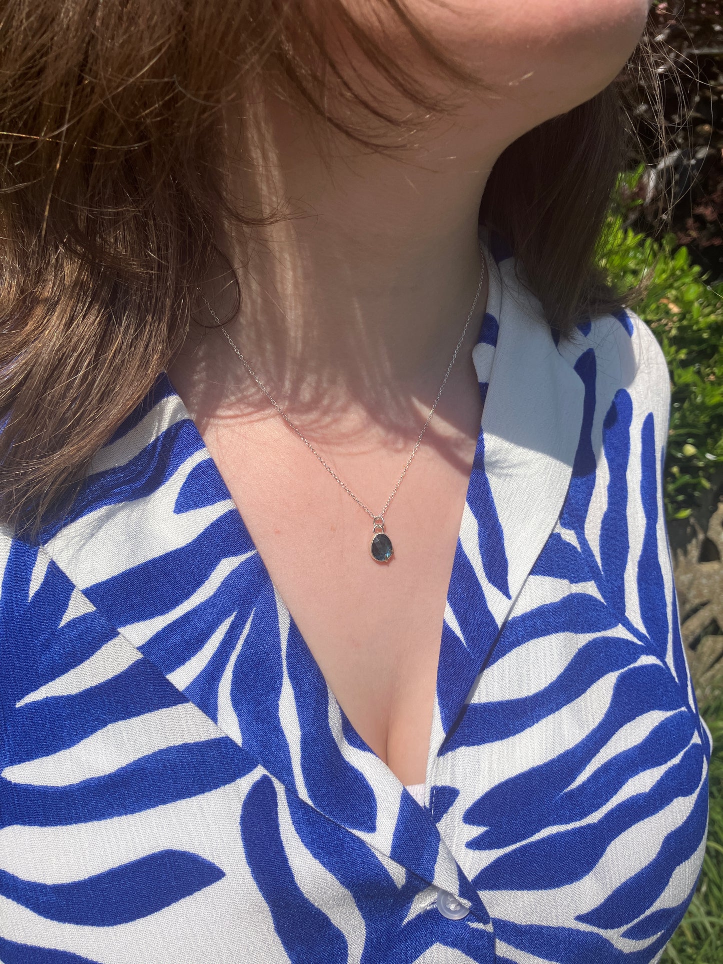 London Blue Topaz and Sterling Silver Pendant Necklace with 9ct Gold Claw Detail on Sterling Silver Chain